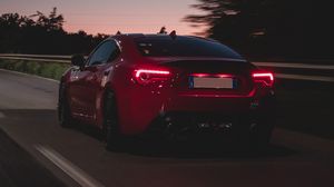 Preview wallpaper car, road, speed, dusk, red