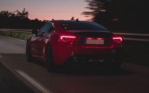 Preview wallpaper car, road, speed, dusk, red