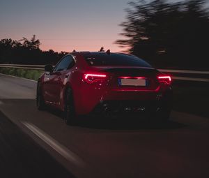 Preview wallpaper car, road, speed, dusk, red