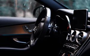 Preview wallpaper car, salon, interior, black, control panel, steering wheel