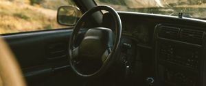 Preview wallpaper car, salon, steering wheel, map, travel