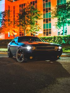 Preview wallpaper car, side view, black, building, headlights, lights