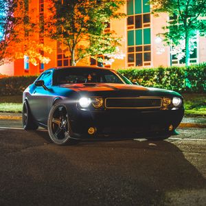 Preview wallpaper car, side view, black, building, headlights, lights