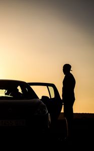 Preview wallpaper car, silhouette, dark, twilight, door, open