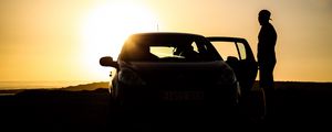 Preview wallpaper car, silhouette, dark, twilight, door, open