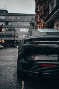 Preview wallpaper car, sports car, black, wet, rear view