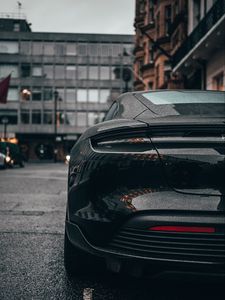 Preview wallpaper car, sports car, black, wet, rear view