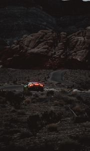 Preview wallpaper car, sports car, mountains, lights, relief, rocks