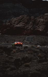 Preview wallpaper car, sports car, mountains, lights, relief, rocks
