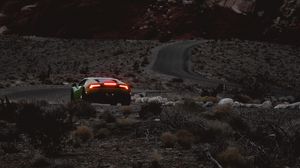 Preview wallpaper car, sports car, mountains, lights, relief, rocks