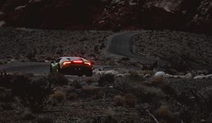 Preview wallpaper car, sports car, mountains, lights, relief, rocks