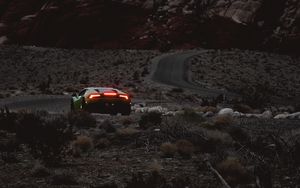 Preview wallpaper car, sports car, mountains, lights, relief, rocks