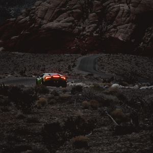 Preview wallpaper car, sports car, mountains, lights, relief, rocks