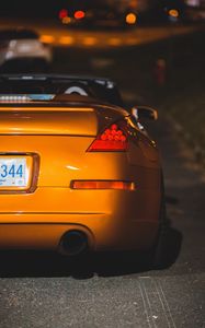 Preview wallpaper car, sports car, rear view, yellow, headlight