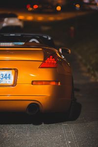 Preview wallpaper car, sports car, rear view, yellow, headlight