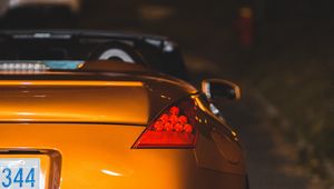 Preview wallpaper car, sports car, rear view, yellow, headlight