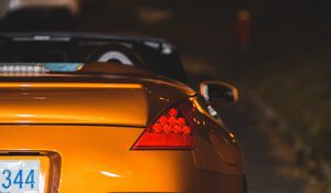 Preview wallpaper car, sports car, rear view, yellow, headlight