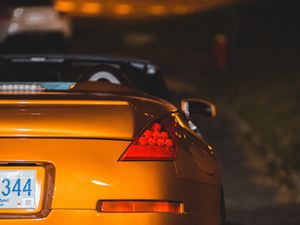 Preview wallpaper car, sports car, rear view, yellow, headlight