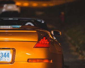 Preview wallpaper car, sports car, rear view, yellow, headlight