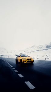 Preview wallpaper car, sports car, yellow, road, snow