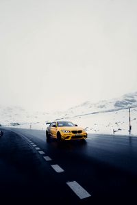 Preview wallpaper car, sports car, yellow, road, snow