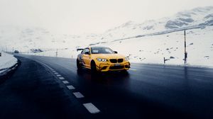 Preview wallpaper car, sports car, yellow, road, snow