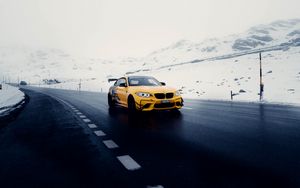 Preview wallpaper car, sports car, yellow, road, snow