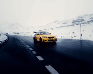 Preview wallpaper car, sports car, yellow, road, snow