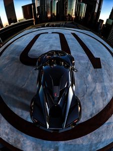 Preview wallpaper car, sportscar, black, aerial view, parking, city