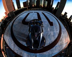 Preview wallpaper car, sportscar, black, aerial view, parking, city