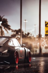 Preview wallpaper car, sportscar, black, wet, road