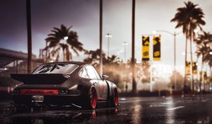 Preview wallpaper car, sportscar, black, wet, road