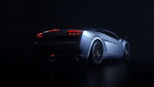 Preview wallpaper car, sportscar, dark, rear view, backlight