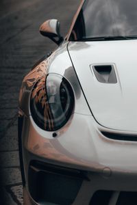 Preview wallpaper car, sportscar, gray, headlight