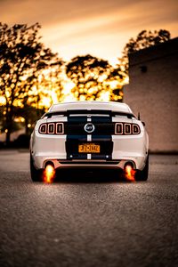 Preview wallpaper car, sportscar, white, rear view, fire, power