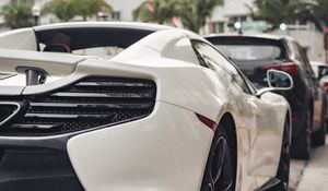 Preview wallpaper car, sportscar, white, rear view, street
