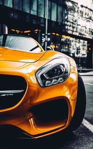 Preview wallpaper car, sportscar, yellow, headlight, front view