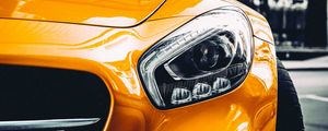 Preview wallpaper car, sportscar, yellow, headlight, front view