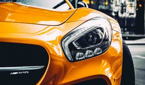 Preview wallpaper car, sportscar, yellow, headlight, front view