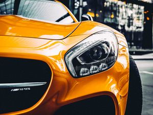 Preview wallpaper car, sportscar, yellow, headlight, front view