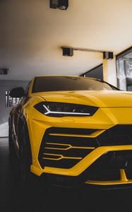 Preview wallpaper car, sportscar, yellow, front view, headlight