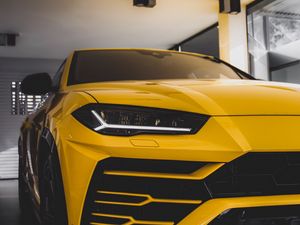 Preview wallpaper car, sportscar, yellow, front view, headlight