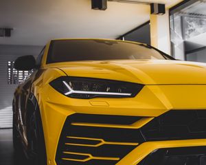 Preview wallpaper car, sportscar, yellow, front view, headlight