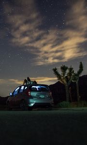 Preview wallpaper car, starry sky, man, loneliness, palm trees, solitude