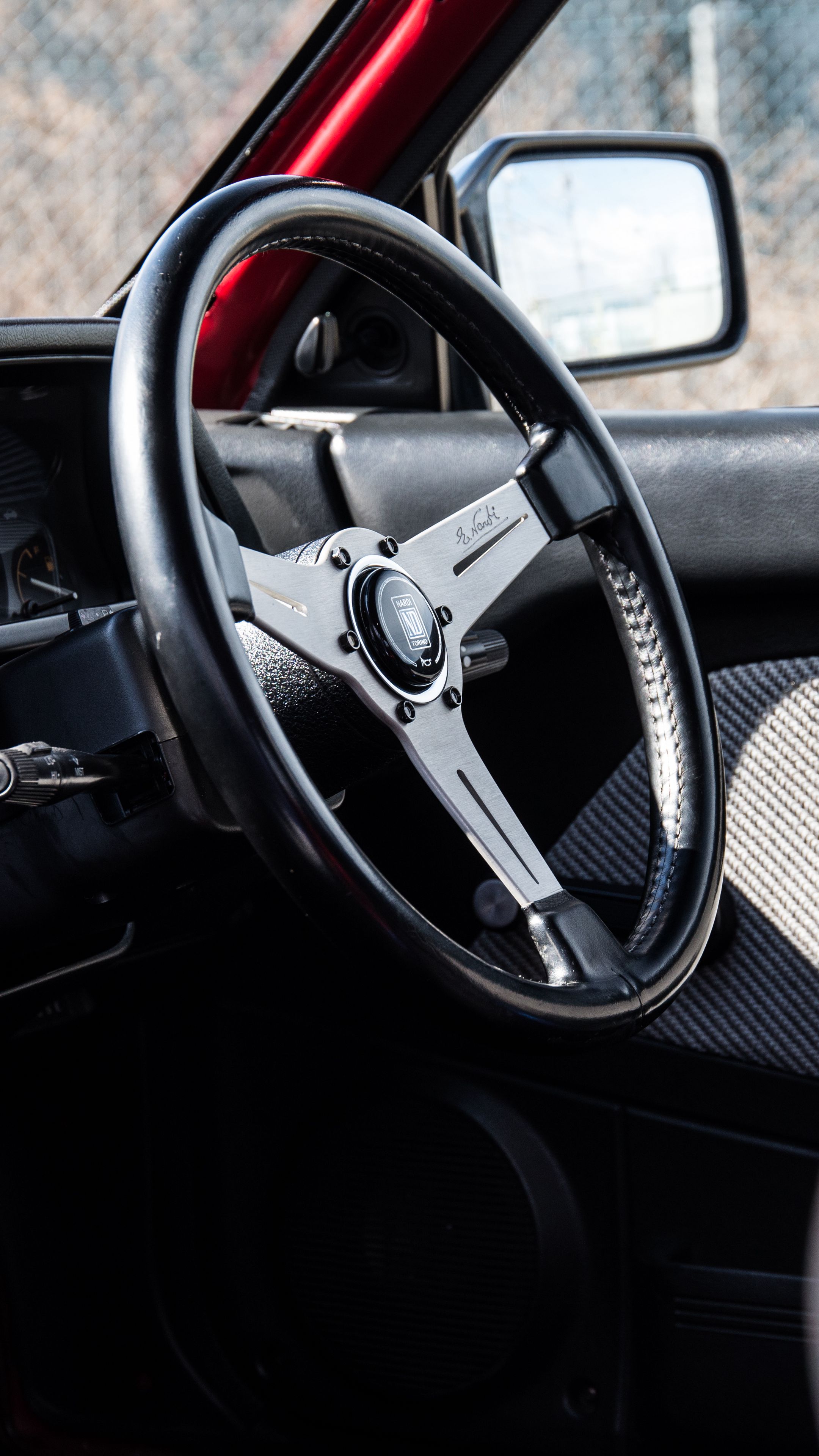 Download wallpaper 2160x3840 car, steering wheel, dark samsung galaxy