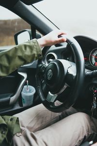 Preview wallpaper car, steering wheel, hand, driver