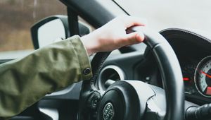 Preview wallpaper car, steering wheel, hand, driver