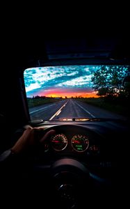 Preview wallpaper car, steering wheel, road, journey, sunset