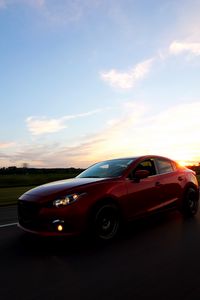 Preview wallpaper car, sunset, motion