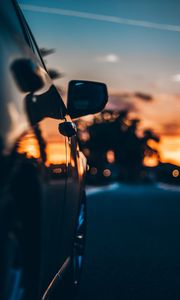 Preview wallpaper car, sunset, movement, mirror blur